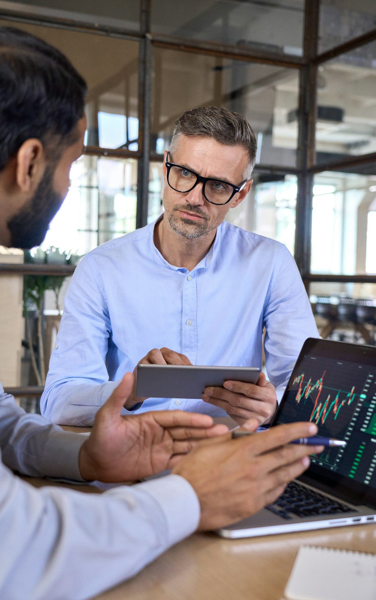 Two traders brokers stock exchange market investors discussing crypto Investing.